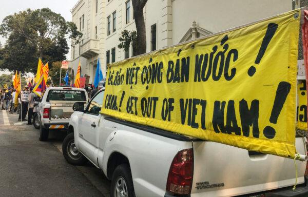 A pickup truck displays a banner that reads, “China! Get out of Vietnam!” at the Chinese Consulate in San Francisco on Oct. 1, 2020. (Ilene Eng/The Epoch Times)