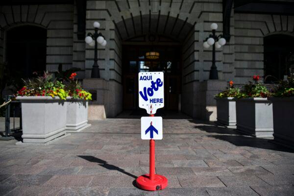 A voting sign sits outside the Union Station polling center in Denver, Colo., on June 30, 2020. (Michael Ciaglo/Getty Images)