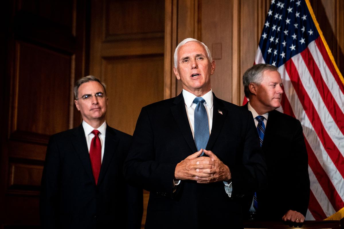  Vice President Mike Pence, center, with White House counsel Pat Cipollone, left, and White House chief of staff Mark Meadows, speaks to reporters after meeting with Supreme Court nominee Amy Coney Barrett in Washington on Sept. 29, 2020. (Susan Walsh/Pool/AFP via Getty Images)