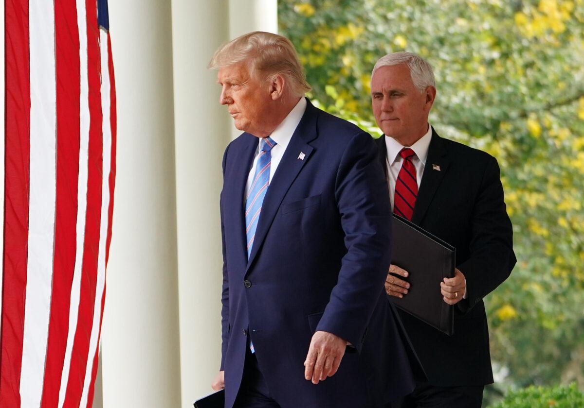 President Donald Trump and Vice President Mike Pence arrive to speak on COVID-19 testing in the Rose Garden of the White House in Washington on Sept. 28, 2020. (Mandel Ngan/AFP via Getty Images)