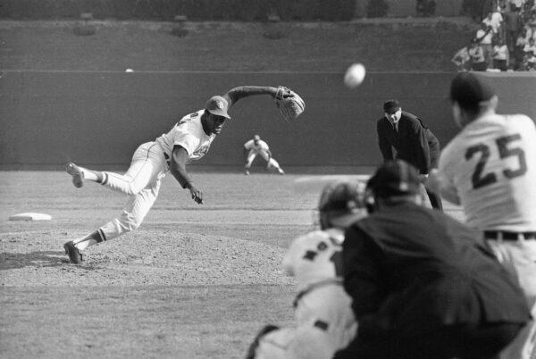 St. Louis Cardinals ace pitcher Bob Gibson throws to Detroit Tigers' Norm Cash during the ninth inning of Game 1 of the baseball World Series at Busch Stadium in St. Louis, Mo., on Oct. 2, 1968. (AP Photo, File)