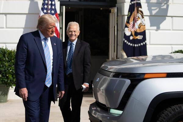 President Donald Trump and White House trade adviser Peter Navarro check out the new Endurance all-electric pickup truck on the south lawn of the White House in Washington on Sept. 28, 2020. (Tasos Katopodis/Getty Images)