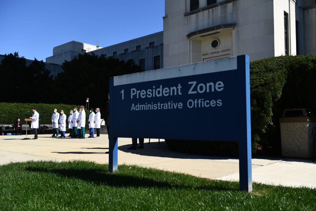 White House physician Sean Conley (at podium) gives an update on the condition of President Donald Trump, outside Walter Reed National Military Medical Center, in Bethesda, Md., on Oct. 3, 2020. (Brendan Smialowski/AFP via Getty Images)