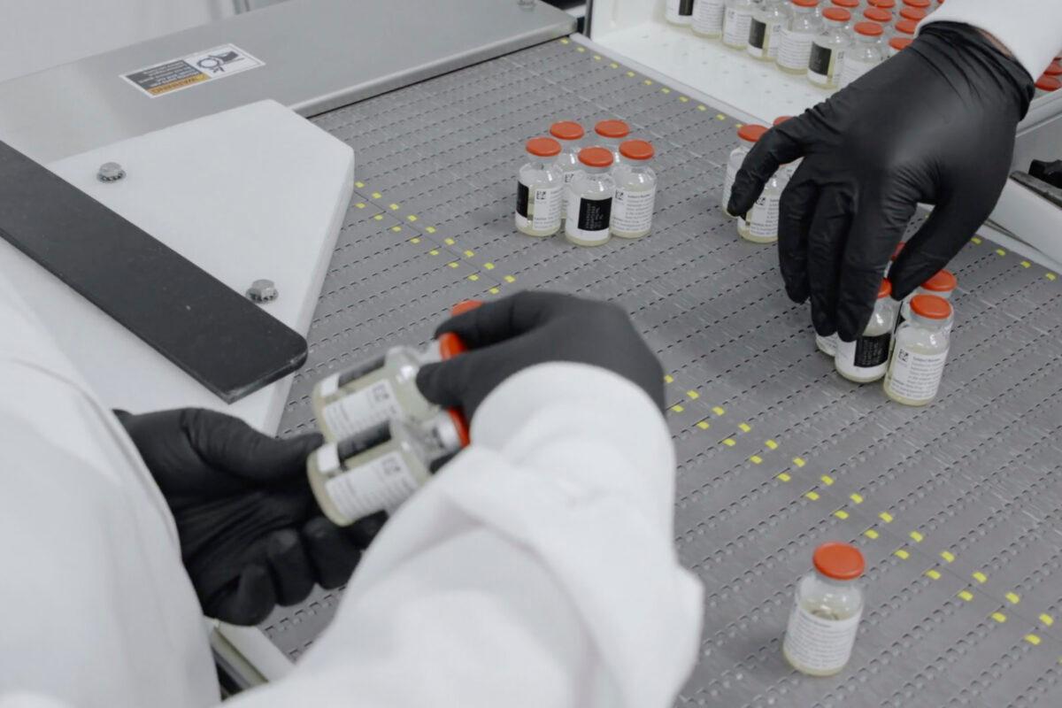 Vials are inspected in the Regeneron Pharmaceuticals's facilities in New York state, for efforts on an experimental CCP virus antibody cocktail, in this undated image from video provided by the company on Oct. 2, 2020. (Regeneron via AP)