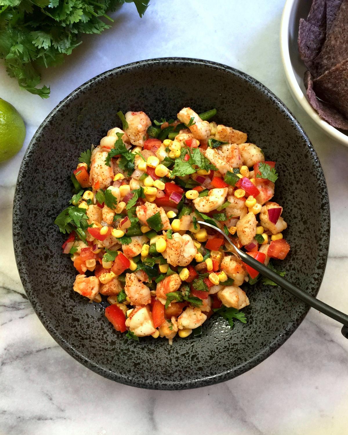 Sweet, tender shrimp shine among a kaleidoscope of colorful ingredients. (Lynda Balslev for TasteFood)