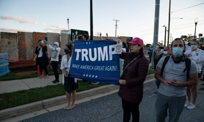 Pro, Anti-Trump Groups Gather Outside Walter Reed, Where Trump Is Being Treated