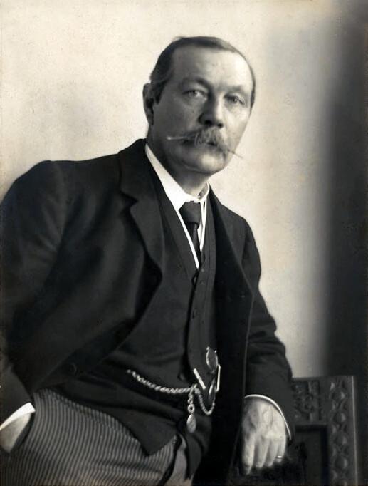Arthur Conan Doyle (1859–1930), Sherlock Holmes's creator, in 1914. (Public Domain)