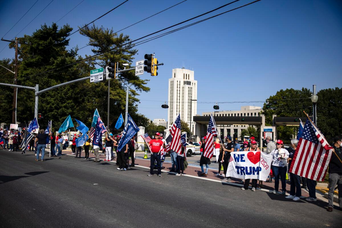Supporters of President Donald Trump gather outside of Walter Reed National Military Medical Center in Bethesda, Md., on Oct. 4, 2020. (Samuel Corum/Getty Images)
