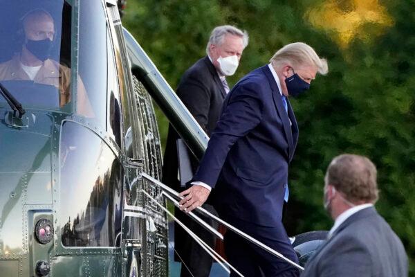 U.S. President Donald Trump arrives at Walter Reed National Military Medical Center in Bethesda, Md., on the Marine One helicopter on Oct. 2, 2020. (Jacquelyn Martin/AP Photo)