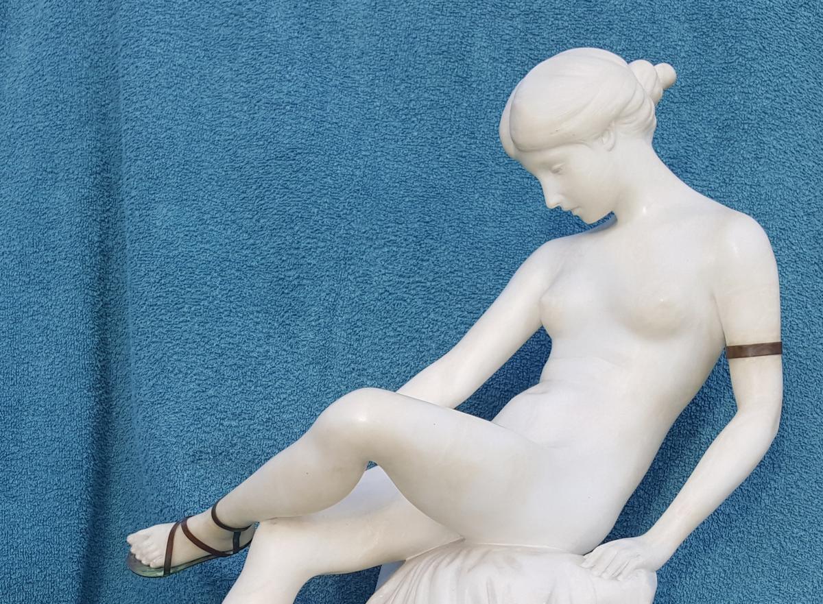 Taking You There: ‘Seated Maiden Lacing Her Sandal’