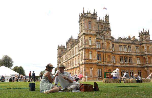 Visitors attend a 1920s themed event at Highclere Castle on Sept. 7, 2019. (ISABEL INFANTES/AFP via Getty Images)