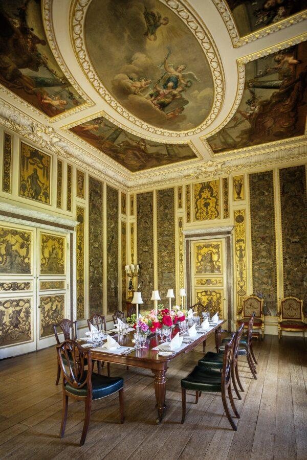 The music room is adorned with Italian tapestries. Its ceiling was painted in the 1730s by Francis Hayman, a founding member of the Royal Academy of Arts. (Courtesy of Highclere Castle)