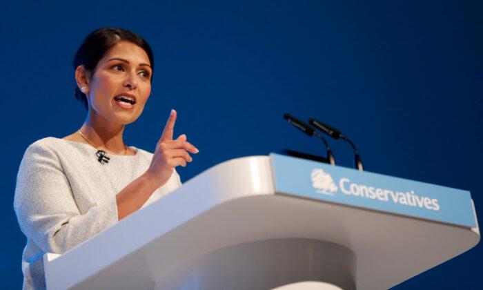 Britain's Home Secretary Priti Patel addresses the Conservative Party Conference in Manchester, England, on Oct. 1, 2019. (Frank Augstein/AP Photo)