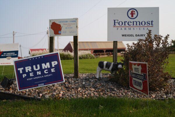 A sign on farmer Tom Weigel's property shows his support for President Donald Trump, in Platteville, Wis., on Sept. 21, 2020. (Cara Ding/The Epoch Times)
