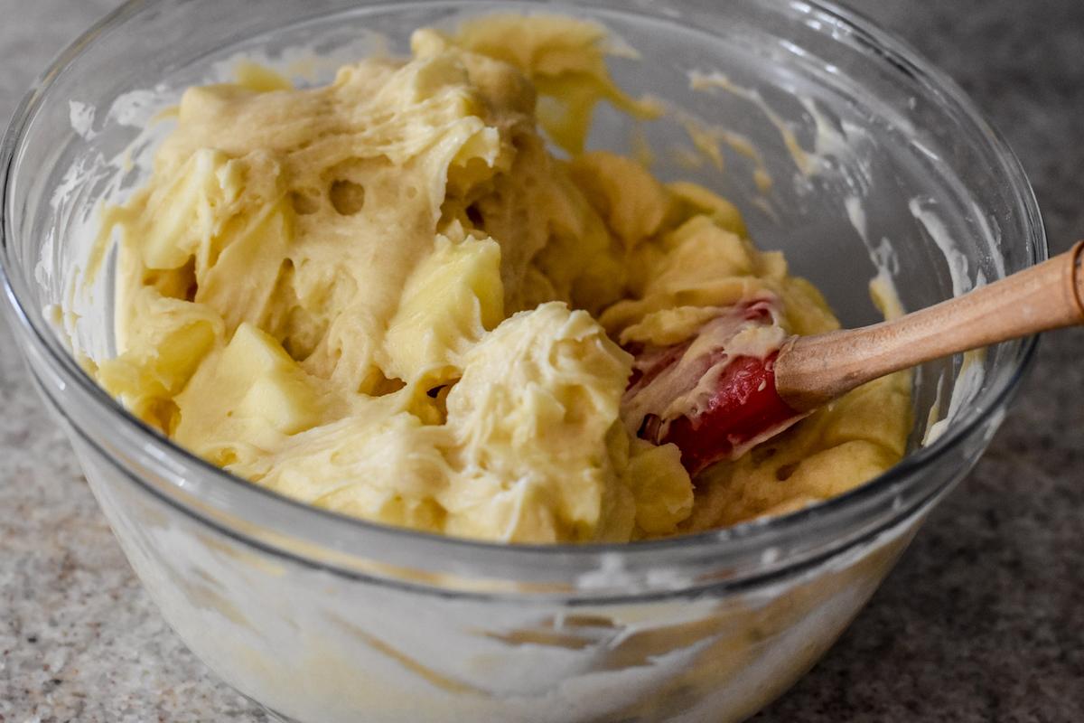 Fold the apple chunks into the batter. (Audrey Le Goff)