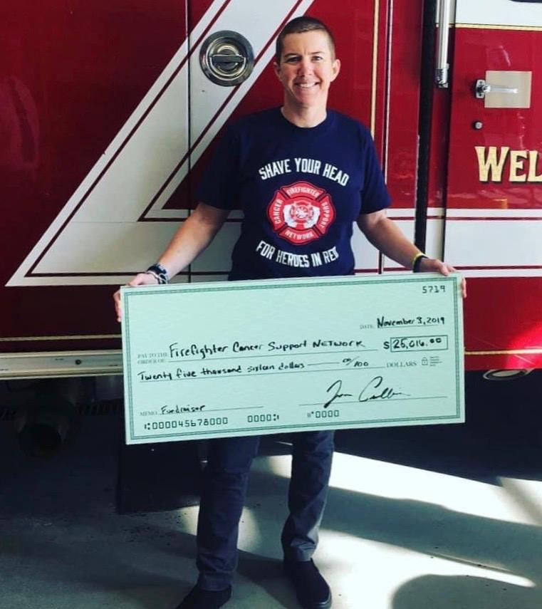 On November 3rd, FF Cullinan, with the support and help of Chief Delorie and the Wellesley Fire Department, hosted a fundraiser called “shave your heads for heroes in red” to raise awareness for occupational cancer. Chief Delorie, FF Cullinan, and on-duty members presented the Firefighter Cancer Support Network with a check for $25,016. (Courtesy of <a href="https://www.facebook.com/joan.p.cullinan">Joanie Cullinan</a>)