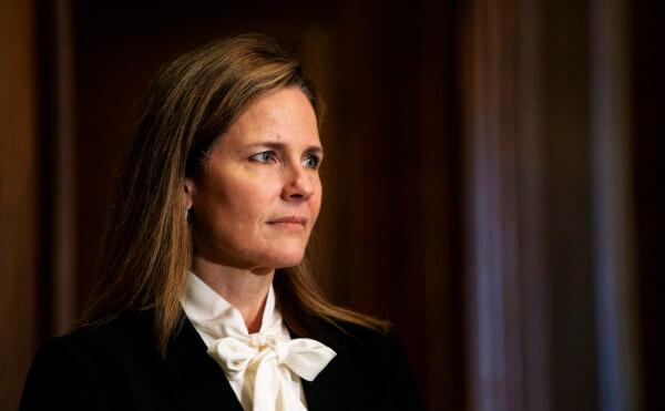 Judge Amy Coney Barrett, President Donald Trump's nominee for the Supreme Court, meets with Sen. Josh Hawley (R-Mo.) on Capitol Hill in Washington on Oct. 1, 2020. (Demetrius Freeman/The Washington Post via AP, Pool)