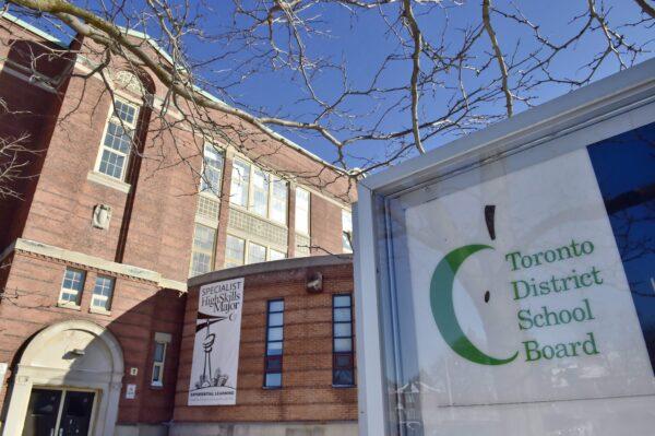 A Toronto District School Board logo is seen on a sign in front of a high school in Toronto, on Jan. 30, 2018. (Frank Gunn/The Canadian Press)
