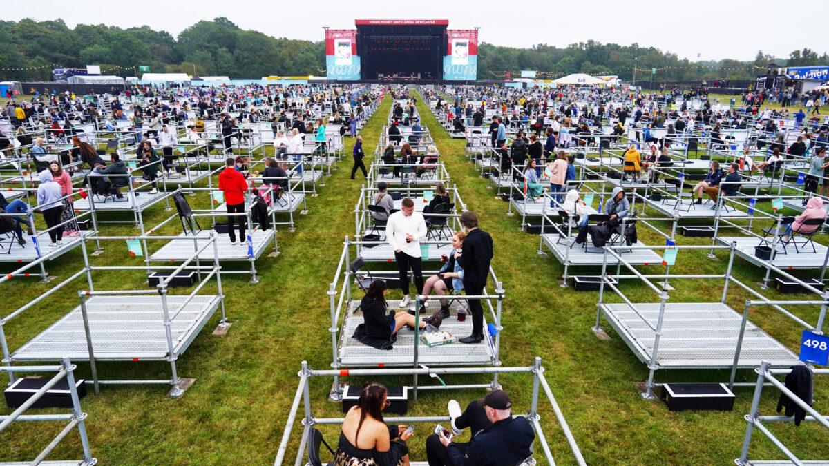 Fans wait in socially distanced enclosures to see Sam Fender as he performs at the Virgin Money Unity Arena in Newcastle upon Tyne, England on August 13, 2020. (Ian Forsyth/Getty Images)