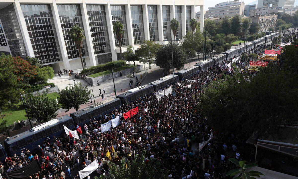 Thousands of people gather for a protest outside the court where the verdict was delivered, in Athens, on Oct. 7, 2020. (Yorgos Karahalis/AP Photo)