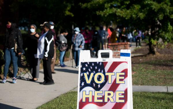 People stand in line outside the Richland County Voter Registration and Elections Office on the second day of in-person absentee and early voting in Columbia, S.C., on Oct. 6, 2020. (Sean Rayford/Getty Images)