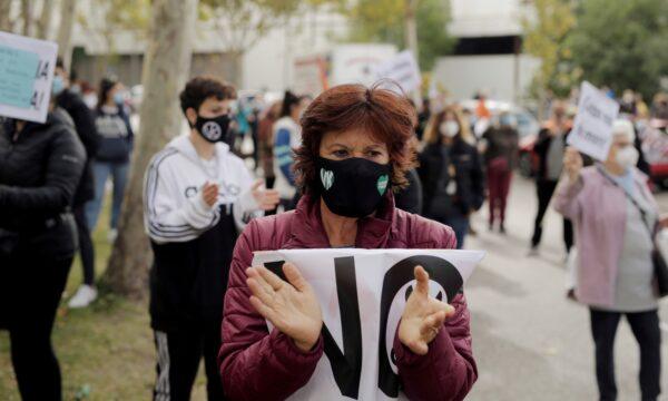 A demonstrator attends a protest against the regional government's measures to control the spread of the coronavirus disease (COVID-19), at Vallecas neighborhood in Madrid, Spain, on Oct. 4, 2020. (Javier Barbancho/Reuters)