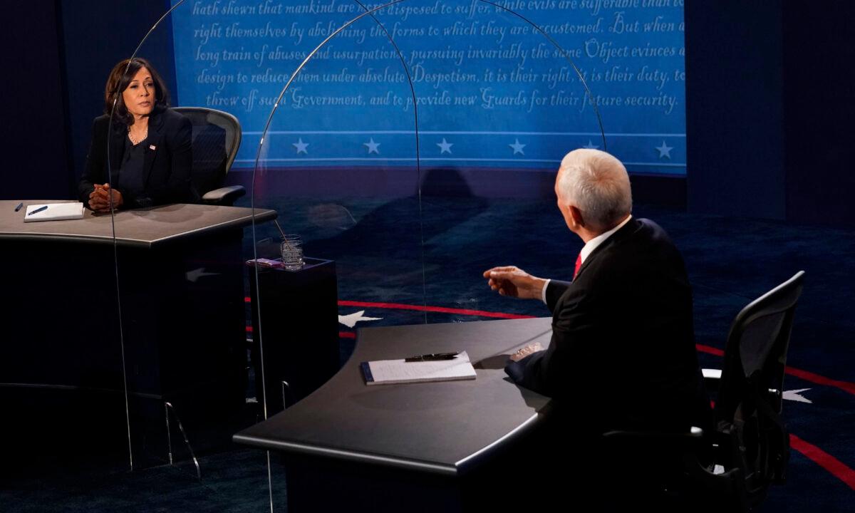 Democratic vice presidential nominee Sen. Kamala Harris (D-Calif.) listens as Vice President Mike Pence answers a question during the vice presidential debate at Kingsbury Hall on the campus of the University of Utah in Salt Lake City on Oct. 7, 2020. (Morry Gash/AP Photo)