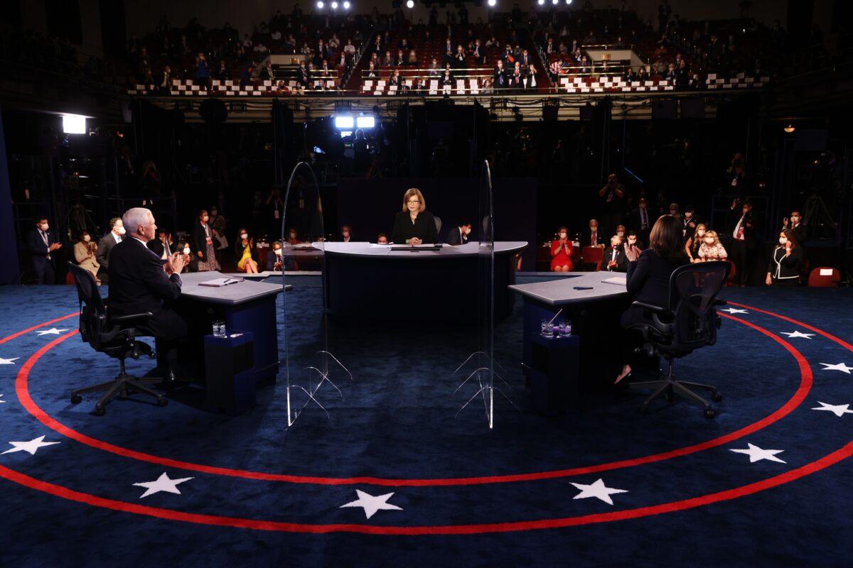 (L-R) Vice President Mike Pence, moderator Susan Page, and Democratic vice presidential nominee Kamala Harris take part in a debate in Salt Lake City, Utah, on Oct. 7, 2020. (Justin Sullivan/Pool/AFP via Getty Images)