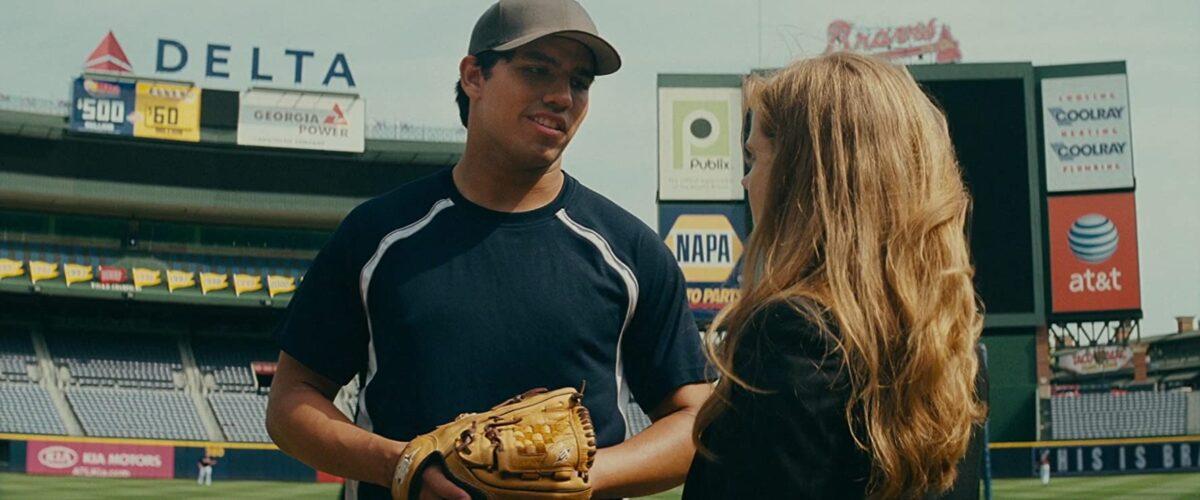 Mickey (Amy Adams) reassures her major league pitching recruit (Jay Galloway), in “Trouble with the Curve.” (Keith Bernstein/Warner Bros Entertainment Inc.)