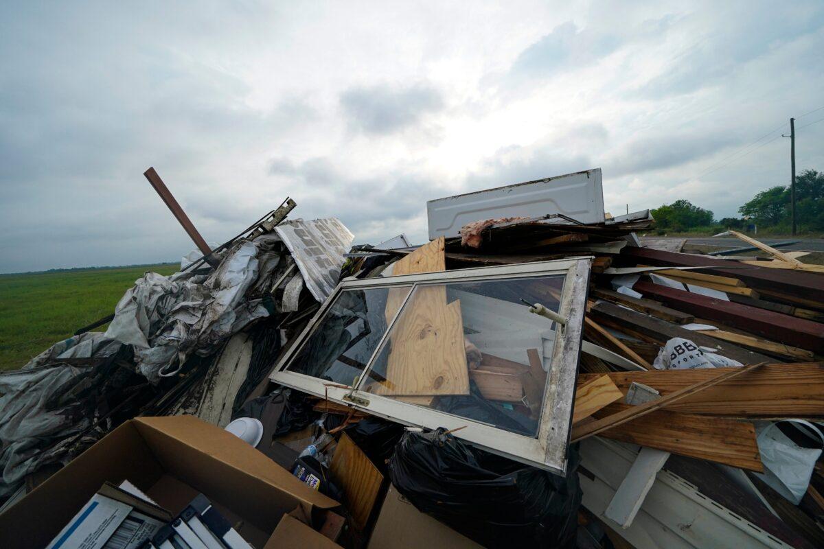 Debris from Hurricane Laura is piled up in Bell City, La., on Oct. 8, 2020. (Gerald Herbert/AP Photo)