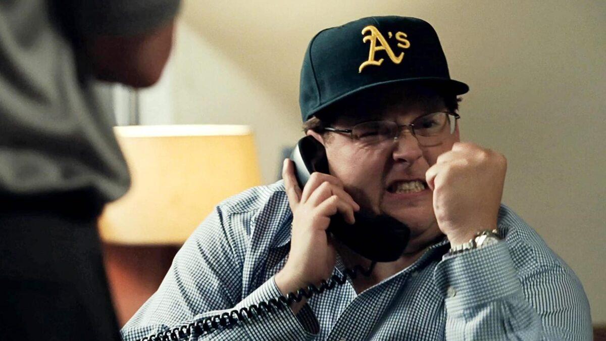 Peter Brand (Jonah Hill), a Yale-educated economist, clinching a player deal, in "Moneyball." (Melinda Sue Gordon/ Columbia TriStar Marketing Group, Inc.)