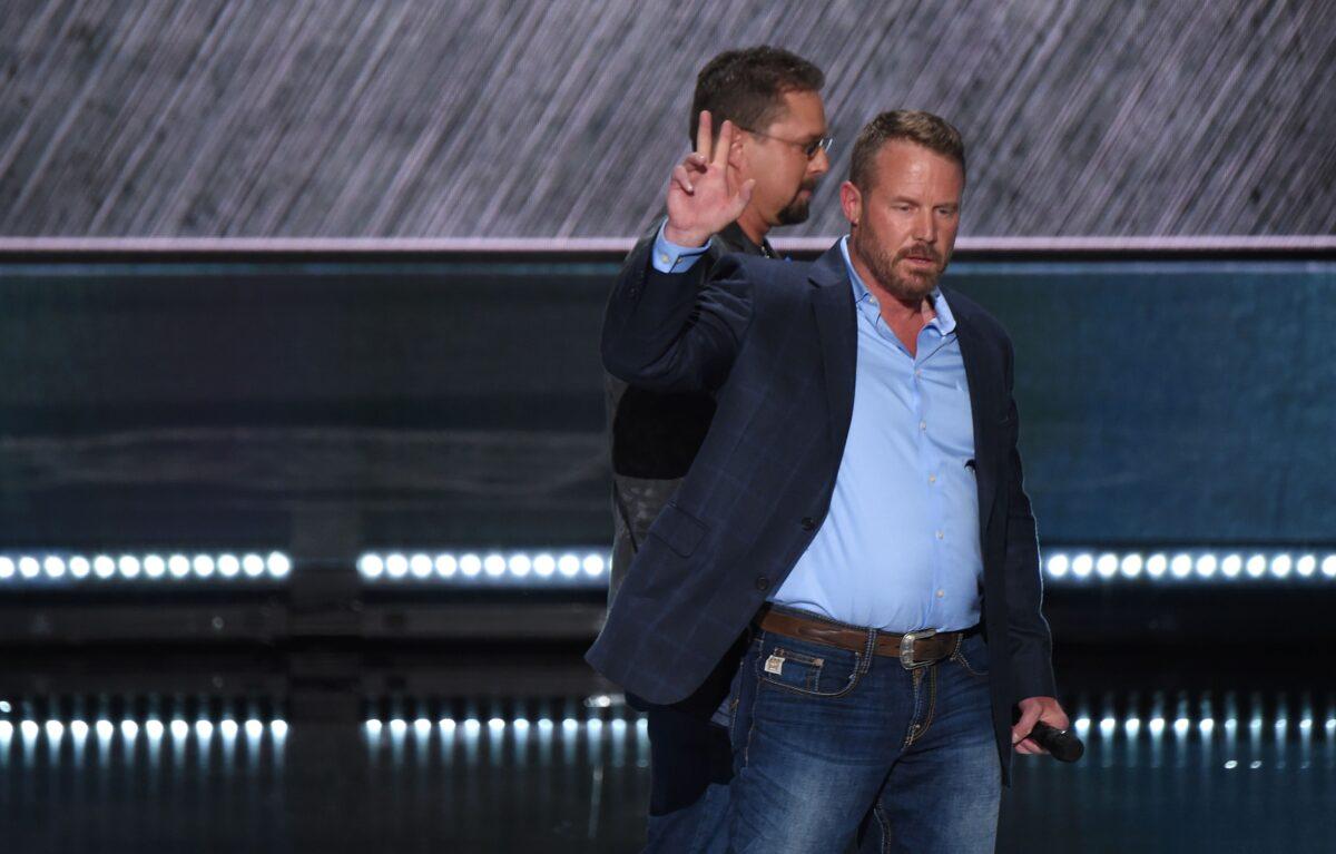 Mark Geist (R) and John Tiegen of the Benghazi Annex Security Team leave the stage after addressing delegates on the first day of the Republican National Convention in Cleveland on July 18, 2016. (Robyn Beck/AFP via Getty Images)