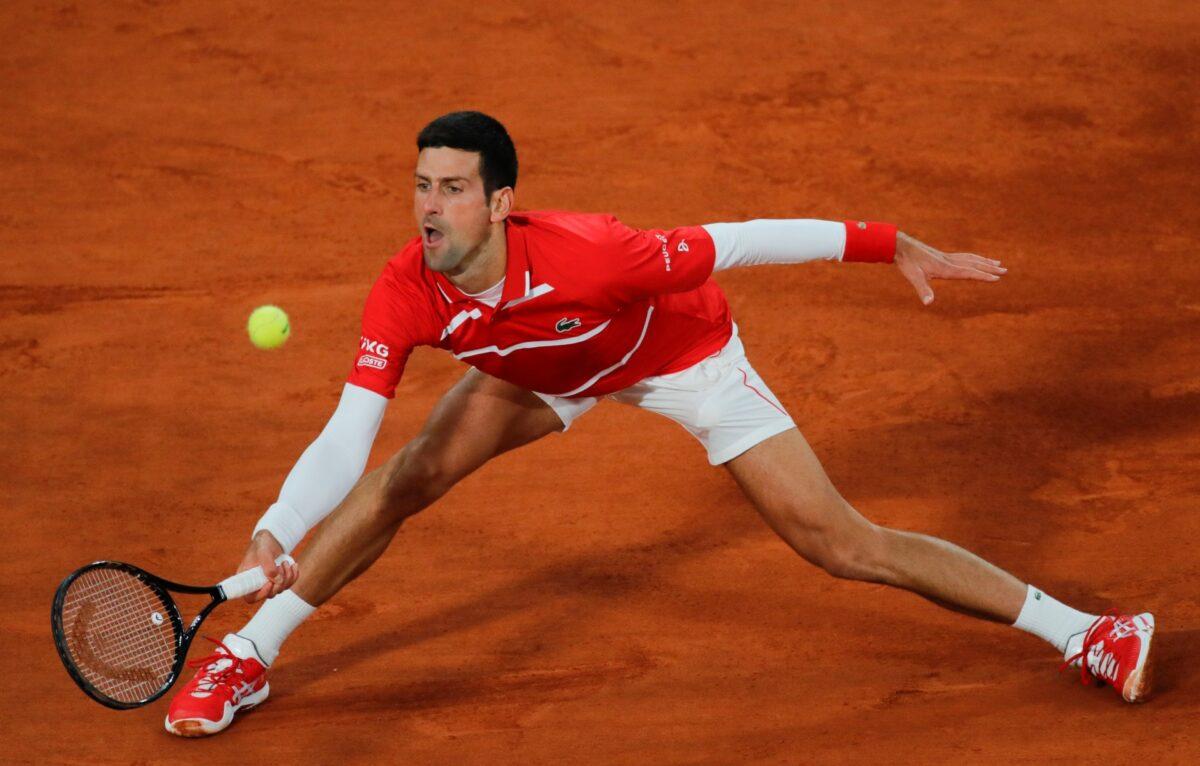 Serbia's Novak Djokovic plays a shot against Spain's Rafael Nadal in the final match of the French Open tennis tournament at the Roland Garros stadium in Paris, France, on Oct. 11, 2020. (Christophe Ena/AP Photo)