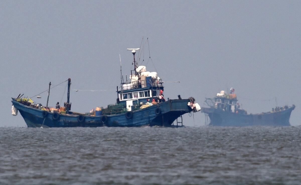 Illegal Chinese fishing boats are seen in neutral waters in Ganghwa island, South Korea, on June 10, 2016. (South Korean Defense Ministry via Getty Images)