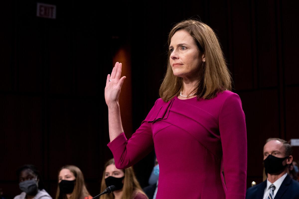 Supreme Court Justice nominee Judge Amy Coney Barrett is sworn in during the Senate Judiciary Committee confirmation hearing for Supreme Court Justice in the Hart Senate Office Building in Washington on Oct. 12, 2020. (Erin Schaff-Pool/Getty Images)