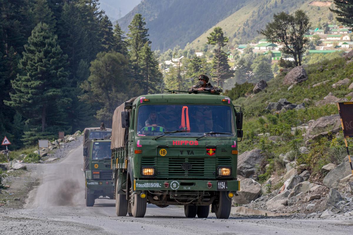 An Indian army convoy moves on the Srinagar- Ladakh highway at Gagangeer, northeast of Srinagar, Indian-controlled Kashmir, on Sept. 9, 2020.(AP Photo/ Dar Yasin)
