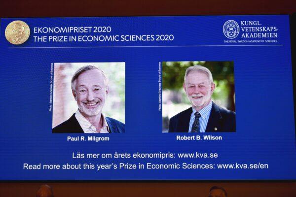 Winners of the Sveriges Riksbank Prize in Economic Sciences in Memory of Alfred Nobel for 2020 at a press conference in Stockholm on Oct. 12, 2020. (Anders Wiklund/TT via AP)