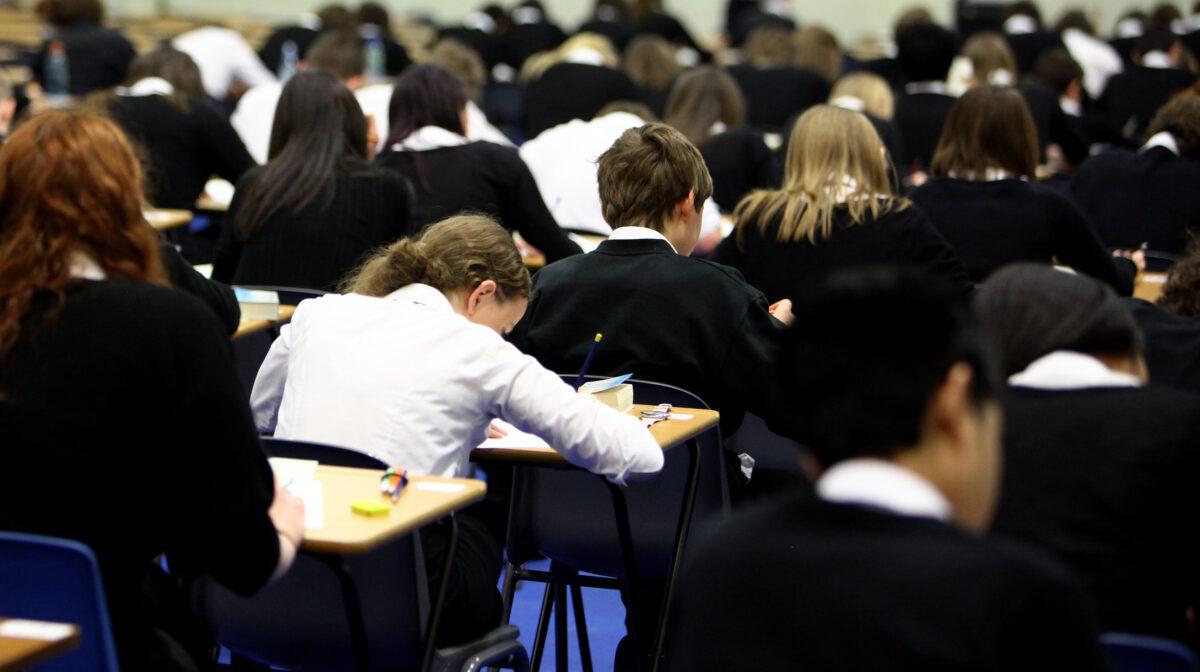 In this file image, pupils at Williamwood High School sit exams in Glasgow, Scotland, on February 5, 2010. (Jeff J Mitchell/Getty Images)