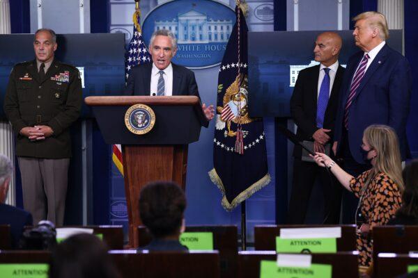 White House coronavirus adviser Dr. Scott Atlas (C) speaks as President Donald Trump (R), Army Gen. Gustave Perna (L), who is leading Operation Warp Speed, and Dr. Moncef Slaoui (2nd R), chief adviser to Operation Warp Speed, listen, during a press conference in the Brady Press Briefing Room at the White House in Washington, on Sept. 18, 2020. (SAUL LOEB/AFP via Getty Images)