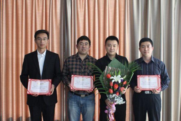 The team led by Zhang Shichao (second from right) was honored by Beijing Yingke Law Firm for their rights protection work in 2014. (Courtesy of Zhang Shichao)