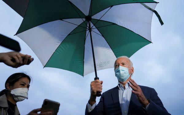 Democratic presidential nominee Joe Biden speaks to reporters upon his departure from Erie, Penn., on Oct. 10, 2020. (Kevin Lamarque/Reuters)