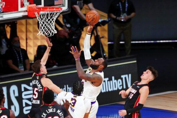 Los Angeles Lakers forward LeBron James (23) shoots in front of Miami Heat guard Duncan Robinson (55) during the third quarter in game six of the 2020 NBA Finals at AdventHealth Arena in Lake Buena Vista, Fla., on Oct 11, 2020. (Kim Klement-USA TODAY Sports)