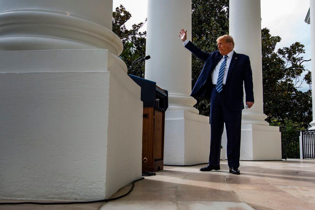 President Donald Trump waves after addressing a rally on the South Lawn of the White House in Washington on Oct. 10, 2020. (Samuel Corum/Getty Images)