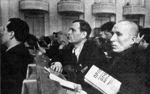 Today it feels like most news we read is propaganda. A 1934 delegate at the 17th Congress of the All-Union Communist Party (Bolsheviks) holds the Soviet mouthpiece: Pravda newspaper. (Public Domain)