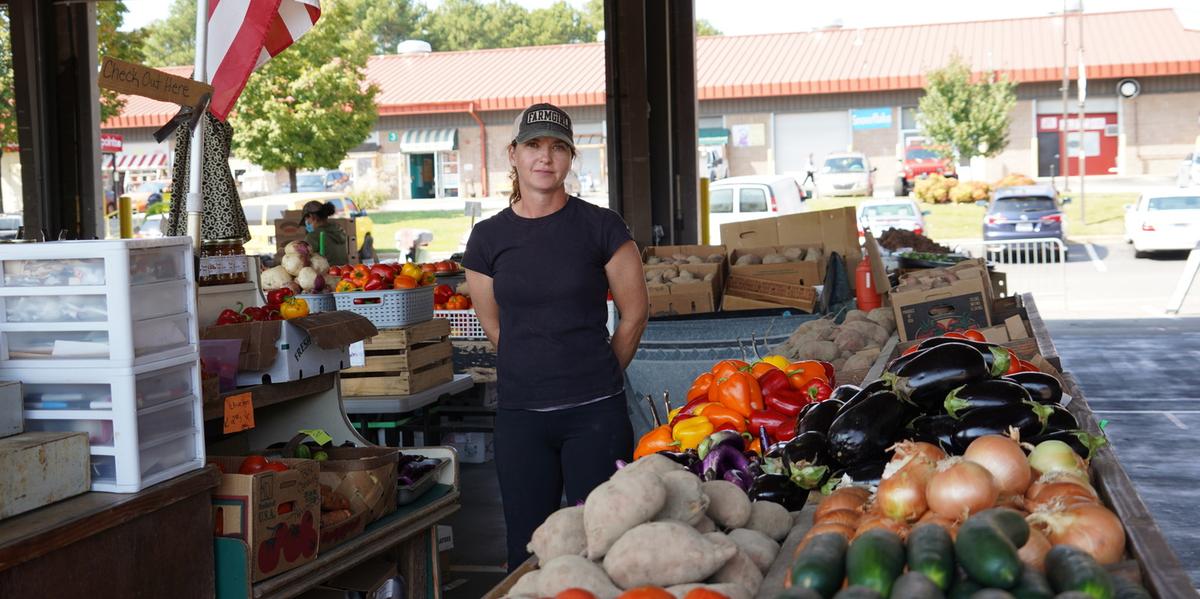 Tammy Wodaoo works at her stand at the Raleigh Farmers Market on Oct. 6, 2020 in Raleigh, N.C. (The Epoch Times)