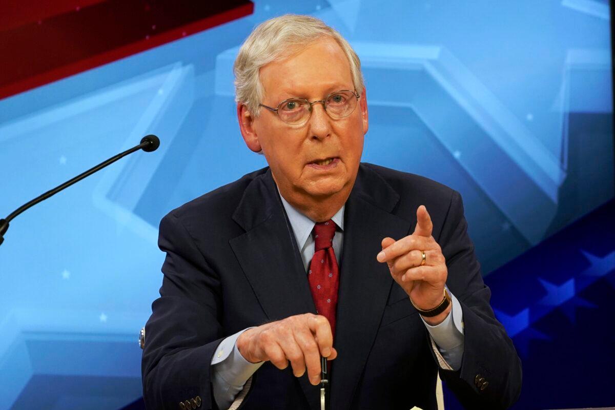 Senate Majority Leader Mitch McConnell (R-Ky.) speaks during a debate with Democratic Senate nominee Amy McGrath, in Lexington, Ky., on Oct. 12, 2020. (Michael Clubb/Pool/Getty Images)