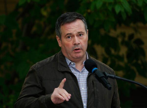 Alberta Premier Jason Kenney answers questions after announcing $43 million in repairs and improvements to provincial parks at a news conference in Calgary, Alta., Canada on Sept. 15, 2020. (Todd Korol/The Canadian Press)