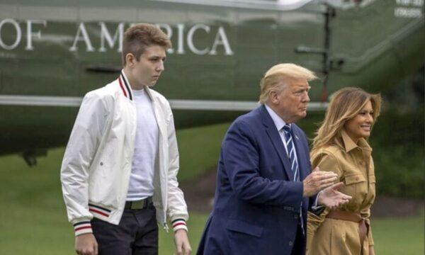 Barron Trump, President Donald Trump and First Lady Melania Trump walk on the South Lawn of the White House in Washington, on Aug. 16, 2020. (Tasos Katopodis/Getty Images)