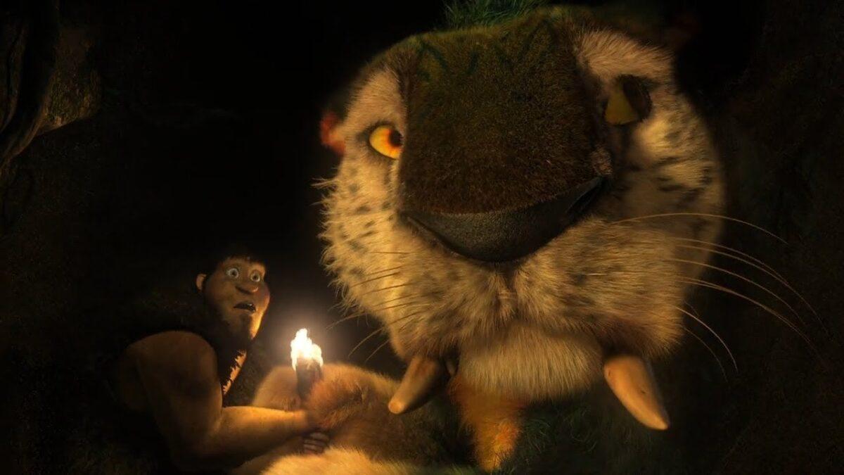 Grug (voiced by Nicolas Cage) and his giant sabertooth kitty pet<span style="color: #0000ff;">, </span>in DreamWorks’ caveman chronicle, “The Croods.” (DreamWorks Animation/Twentieth Century Fox)