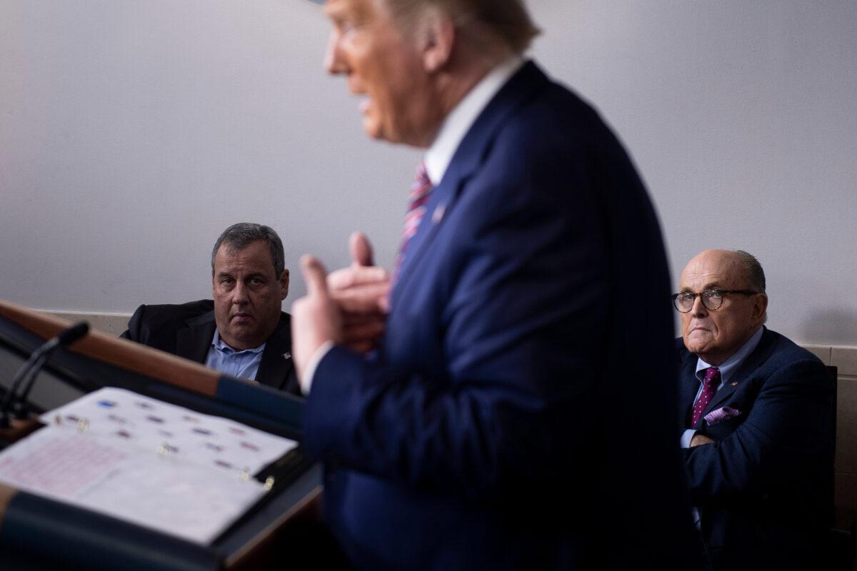 Former New Jersey Governor Chris Christie and former New York City Mayor Rudy Giuliani listen as President Donald Trump speaks to reporters in the White House on Sept. 27, 2020. (Brendan Smialowski/AFP via Getty Images)